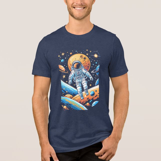 Astronaut lost in space surrounded by planets  Tri-Blend shirt (Front)