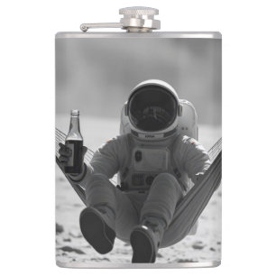 Astronaut on moon with beer hip flask