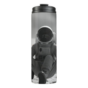 Astronaut on moon with beer thermal tumbler