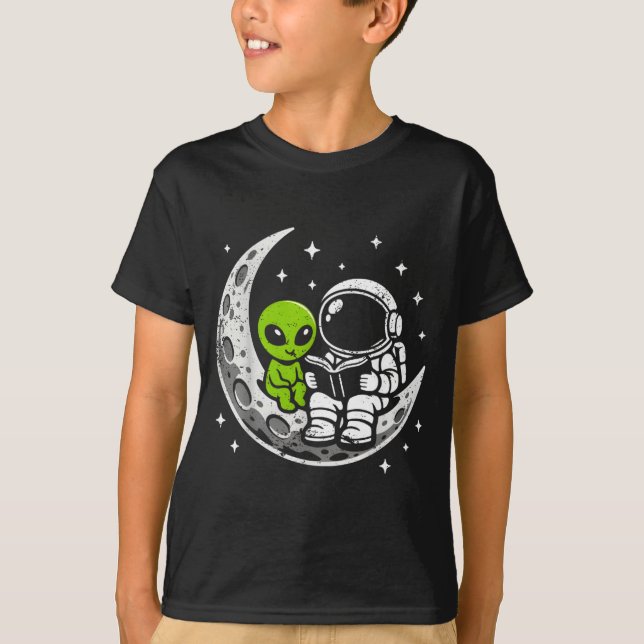 Astronaut reading book alien moon space  T-Shirt (Front)