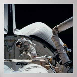 Astronaut working aboard Space Shuttle Endeavour Poster