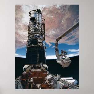 Astronaut working on the Hubble Space Telescope Poster