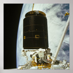 Astronauts capture and repair INTELSAT VI (STS-49) Poster