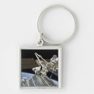 Astronauts perform a series of tasks keychain
