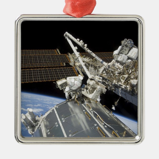 Astronauts perform a series of tasks metal ornament (Front)