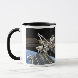 Astronauts perform a series of tasks mug