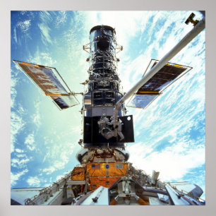 Astronauts work on the Hubble Space Telescope Poster