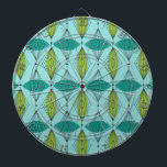 Atomic Ogee and Starbursts Dart Board<br><div class="desc">Oh, gee! It’s an Atomic Ogee and Starbursts Dart Board! It’s a modern take on a classic pattern (a mid century modern take, to be exact). This design features an aqua background with teal and green oval shapes overlaying black, vertical lines of atomic diamonds and starbursts. This mod product brings...</div>