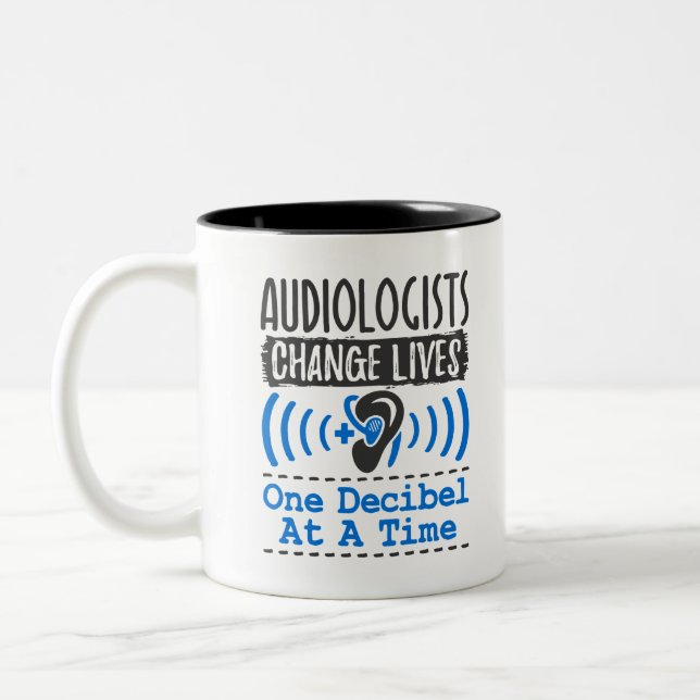 Audiologists Change Lives One Decibel At A Time Two-Tone Coffee Mug (Left)