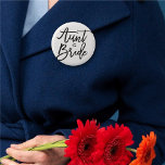 Aunt Of The Bride Brush Script Wedding Bridal  2 Inch Round Button<br><div class="desc">'Aunt of the Bride' Stylish Black Brush Script Bridal Party / Bachelorette Party / Bachelor Party / Wedding Party / Entourage / Team Bride / Wedding Rehearsal Pin Button. This design features a modern and bold brushed calligraphy script on a classic vanilla white background. The base background can be changed...</div>