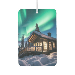 Aurora borealis over winter cabin air freshener