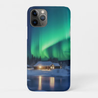 Aurora borealis over winter cabin