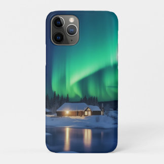 Aurora borealis over winter cabin iPhone 11 pro case