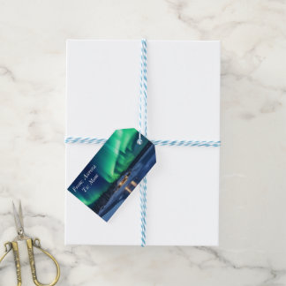 Aurora borealis over winter cabin gift tags