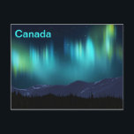 Aurora Borealis Postcard<br><div class="desc">A multi-coloured, fractal rendering of the aurora borealis, or Northern Lights, superimposed on a digital painting of snow-covered mountains. Text reading "Canada" also appears. The aurora borealis (or Northern Lights), named after the Roman goddess of dawn, Aurora, and the Greek name for the north wind, Boreas. Many cultural groups have...</div>