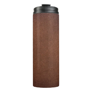 Authentic leather texture, genuine background. thermal tumbler