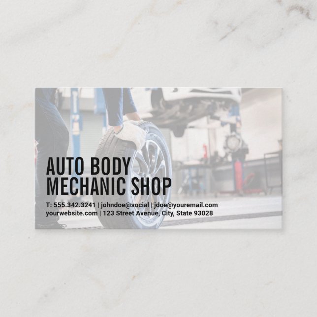 Auto Body Shop | Mechanic Putting on New Tire Business Card (Front)