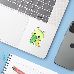 Autocollant de chenille mignonne mangeant une feui