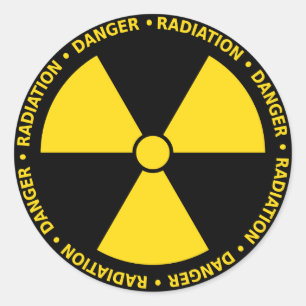 Autocollant jaune de symbole de rayonnement