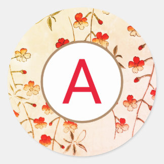 AUTOCOLLANT RONDE FLEUR DE CERISIER AVEC INITIALE 