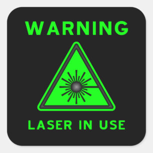 Autocollant vert et noir de signe d'alerte laser