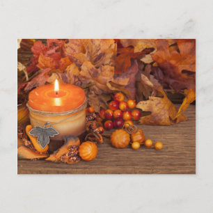 Autumn Candle Over Wooden Background Postcard