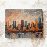 Autumn City Skyline Sunset Jigsaw Puzzle<br><div class="desc">This jigsaw puzzle features an abstract acrylic painting that beautifully captures a cityscape at sunset. It's composed of bold, geometrically shaped buildings standing against the backdrop of a dramatic sky. The buildings, in shades of blue, gray, and black, add a sense of depth and dimension to the scene. The waterfront,...</div>