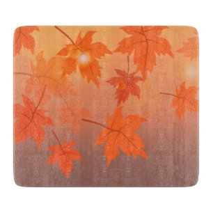 Autumn design with maple leaves and bokeh effect   cutting board