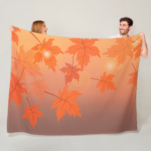 Autumn design with maple leaves and bokeh effect fleece blanket