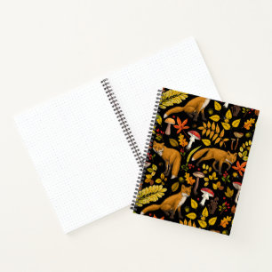 Autumn foxes on black notebook