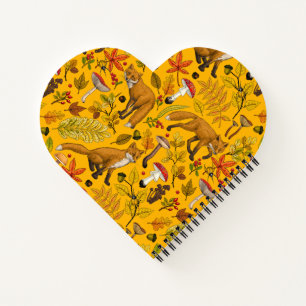 Autumn foxes on black notebook