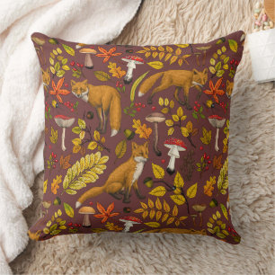 Autumn foxes on chocolate brown throw pillow