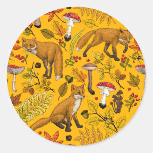 Autumn foxes on orange classic round sticker
