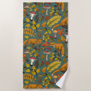 Autumn foxes on pine green beach towel