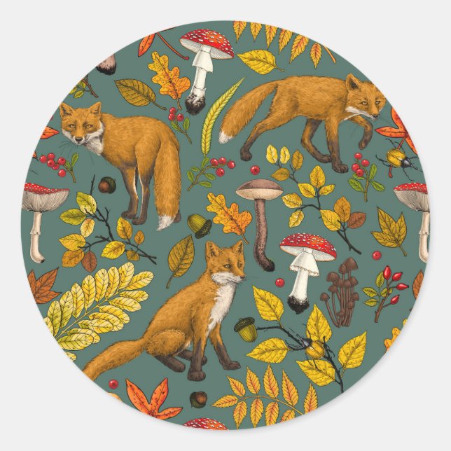 Autumn foxes on pine green classic round sticker (Front)