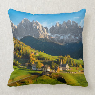 Autumn in a Dolomites landscape with church Throw Pillow