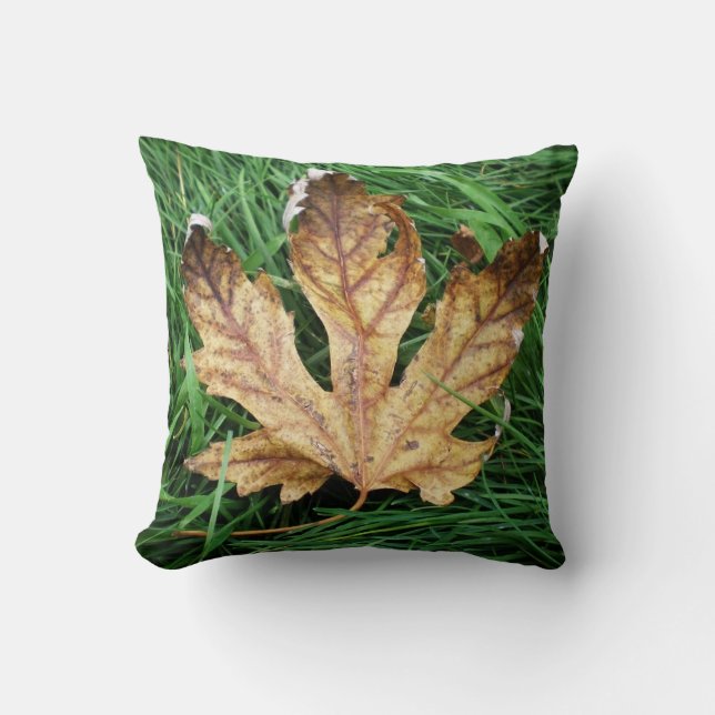 Autumn leaf with green grass throw pillow (Front)