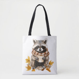 Autumn leaves cozy raccoon with cup of coffee tote bag