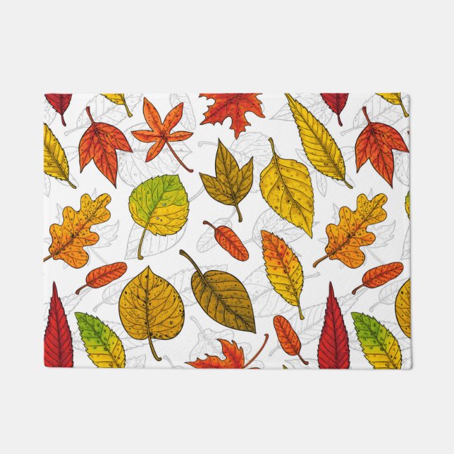 Autumn leaves on white doormat (Front)
