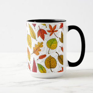 Autumn leaves on white mug