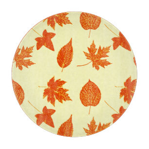 Autumn leaves - pale yellow and orange cutting board