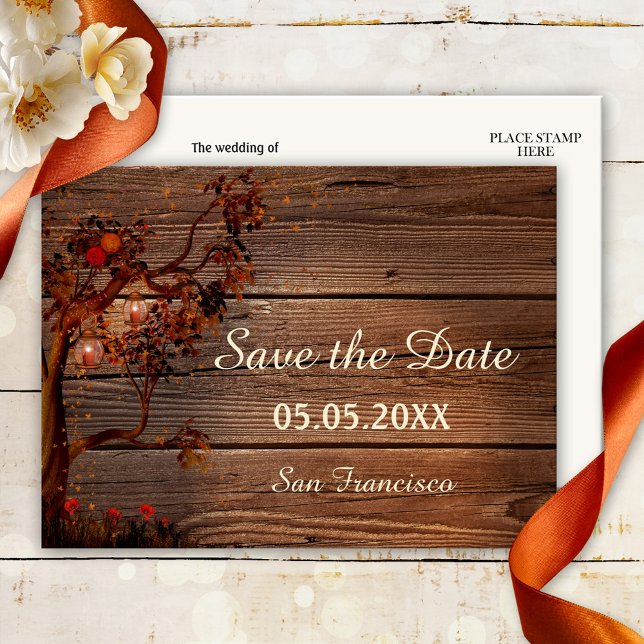 Autumn Lights Save the Date Postcard (Save the Date postcard featuring a tree with colorful leaves, roses and lanterns on rustic wood)