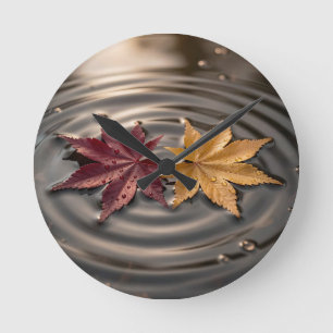 Autumn Maple Leaves Floating on Water Round Clock