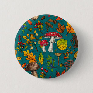 Autumn mushrooms, leaves, nuts and berries on blue 2 inch round button