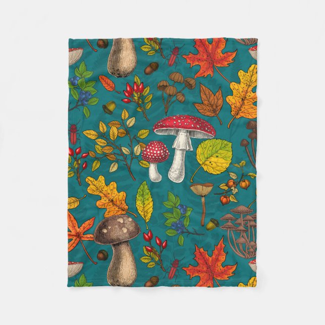 Autumn mushrooms, leaves, nuts and berries on blue fleece blanket (Front)
