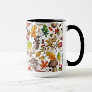 Autumn mushrooms, leaves, nuts and berries on blue mug