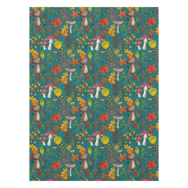 Autumn mushrooms, leaves, nuts and berries on blue tablecloth (Front)
