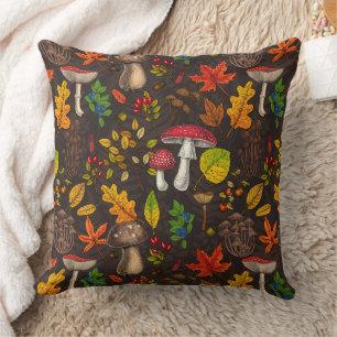 Autumn mushrooms, leaves, nuts and berries on blue throw pillow