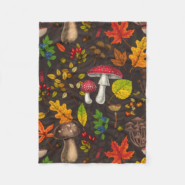 Autumn mushrooms, leaves, nuts and berries on dark fleece blanket (Front)