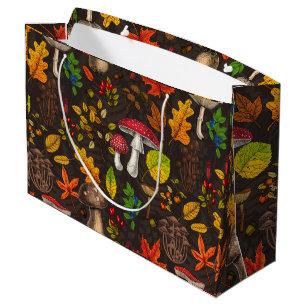 Autumn mushrooms, leaves, nuts and berries on dark large gift bag